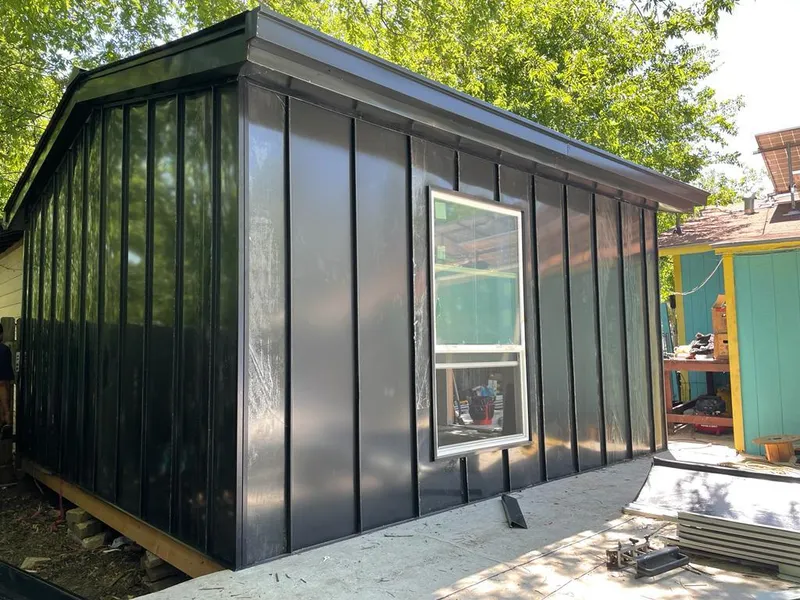 Black standing seam metal wall panels for Roof Inspection in Scappoose